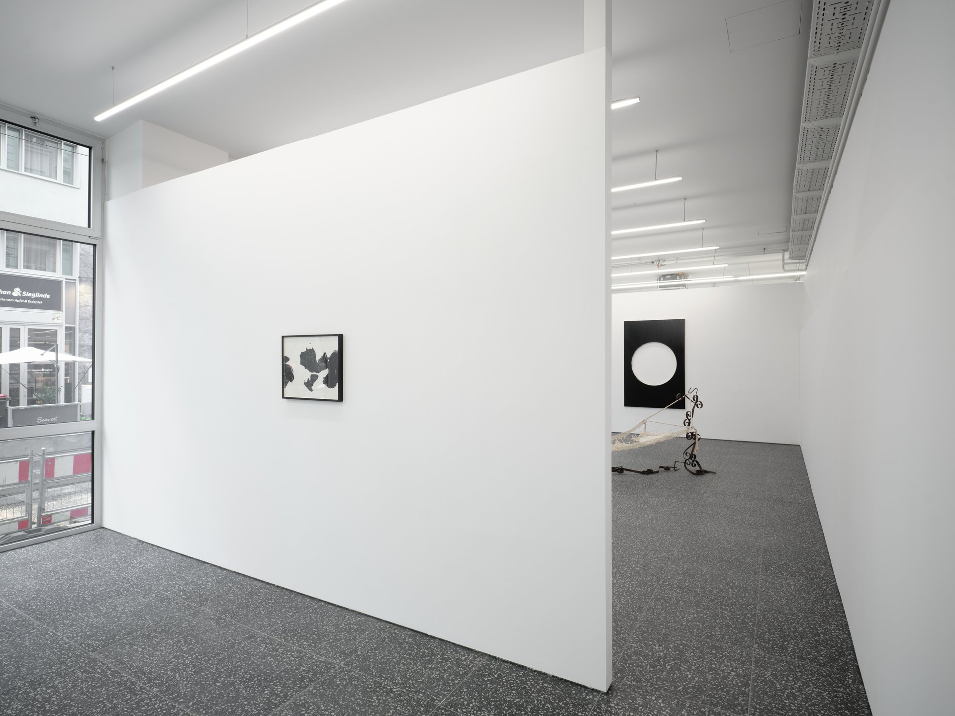 Installation view, Support, Curated By, Gaylen Gerber, Layr, Vienna, 2024Left to right: James Welling, Untitled No. 45, 1984 (printed 1986), gelatin silver print and frame, 42.5 x 52.5 x 3 cm (16 ¾ x 20 5/8 x 1 ¼ inches); Lisa Danielle DeAbreu, Forgotten &amp; Foreseen, 2024, found wrought iron garden gates, cotton thread and thrifted doilies, dimensions vary with installation - approximately 129.5 x 365.7 x 116.8 cm (51 x 144 x 46 inches); Steven Parrino, Freud in Flop, 1987, lacquer on cotton, 180 x 120 cm (70 ¾ x 47 ¼ inches); Heimo Zobernig, ohne Titel, 1992, 2024, dispersion, pressboard, wood, 180 x 2080 x 6 cm (70 7/8 x 818 7/8 x 2 3/8 inches)