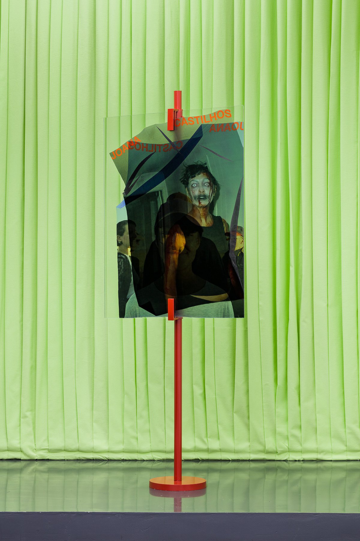 Lili Reynaud-DewarBeyond the Land of Minimal Possessions (Monument to Joana Castilhos), 2018Glass, silk, lacquered metal193 x 75 cm