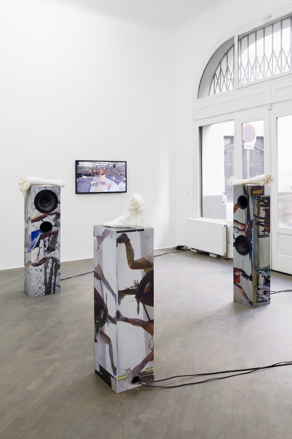 Lili Reynaud-DewarWhy should our bodies end at the skin?, 2012Plaster, wood, prints, speakers, amplifier, videoSpeakers: 122 x 32.5 x 32.5 cm; 122 x 26 x 26 cm; 100 x 26 x 26 cm